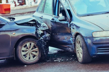 T-bone car accident between two sedan cars.