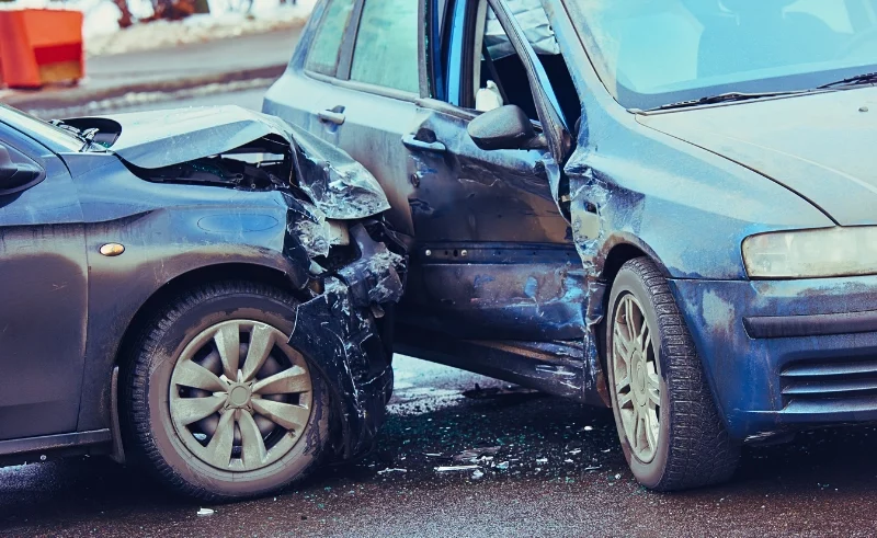 T-bone car accident between two sedan cars.