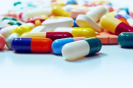 Different types of pills and prescription.