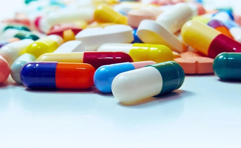 Different types of pills and prescription.