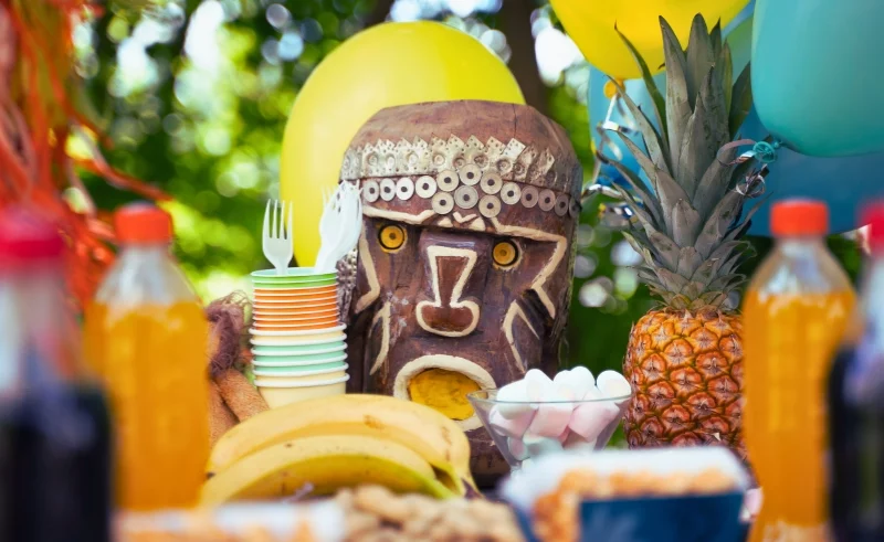 Caribbean theme party with fruits and beverages.